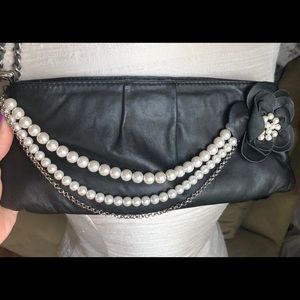 Black faux pearl clutch